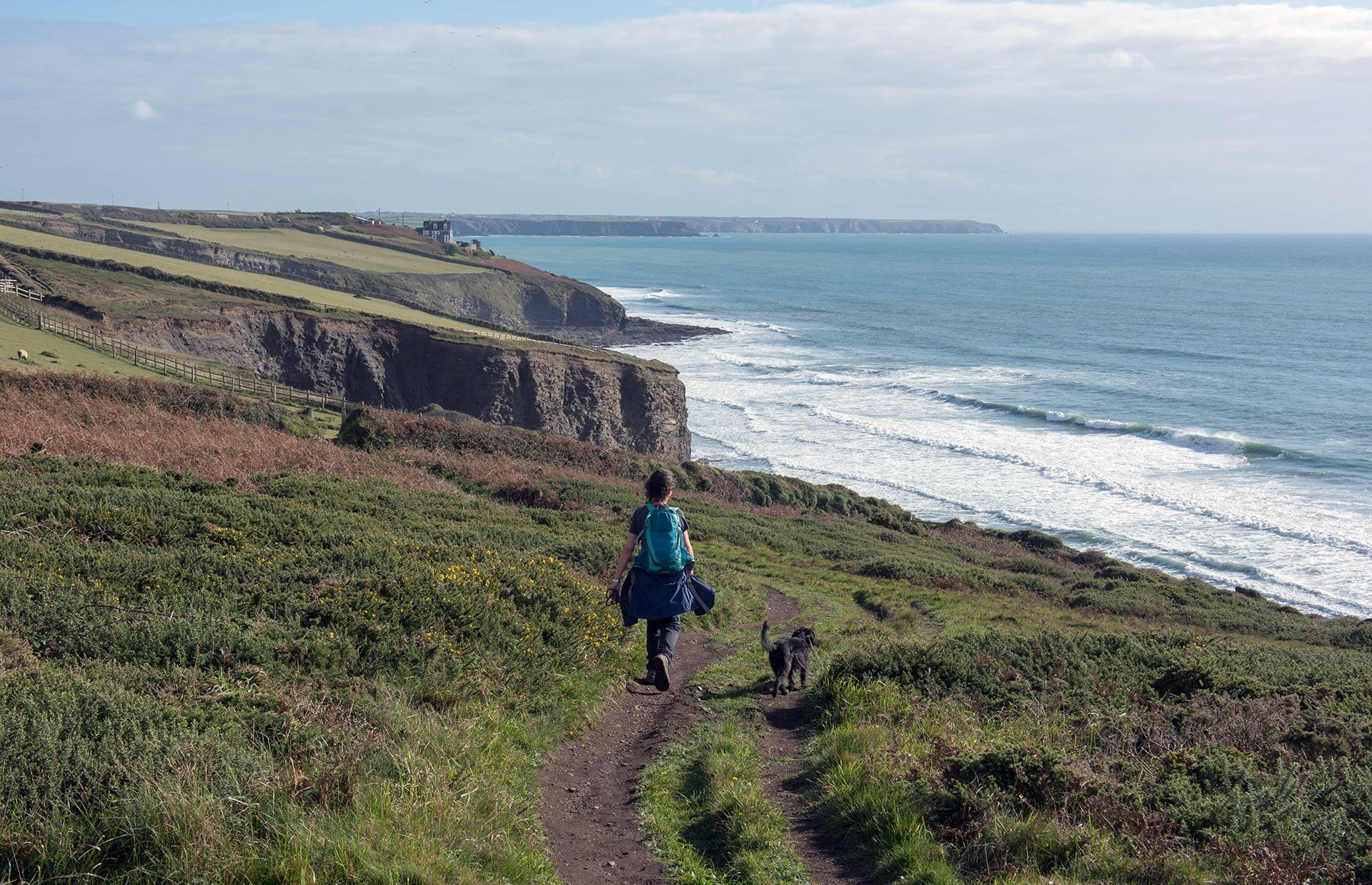 Porthleven and the Lizard Peninsula in the Background by the Atlantic Ocean in Rural Cornwall © Peter Turner Photography/Shutterstock